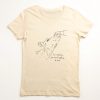 Front image of 'Kindess' tee. Hand patting cow sketch and phrase 'In a world where you can be anything, be kind'