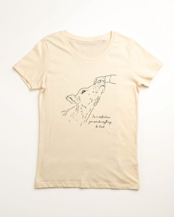 Front image of 'Kindess' tee. Hand patting cow sketch and phrase 'In a world where you can be anything, be kind'