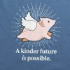 Blue kids shirt with a pic of a flying pig on it and the phrase 'A kinder future is possible.'